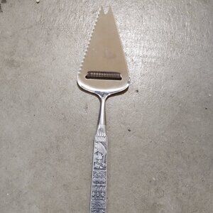 H S Tinn Pewter Handle Cheese Slicer Viking Ship Stave Church Heilag Olav Hans